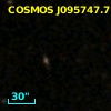 COSMOS J095747.71+013925.6
