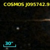 COSMOS J095742.93+013810.3