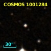 2MASS J09581957+0156242