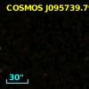 COSMOS J095739.79+015721.7