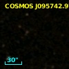 COSMOS J095742.97+015641.9