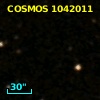 COSMOS J095748.19+015620.8