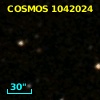 COSMOS J095749.82+015619.5