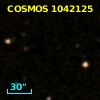 COSMOS J095748.78+015617.4