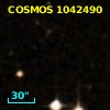 COSMOS J095743.38+015620.5