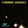COSMOS J095743.78+015613.1
