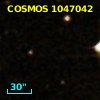 COSMOS J095747.32+015521.9