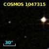 COSMOS J095746.44+015513.3