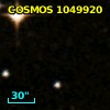COSMOS J095738.91+015431.6