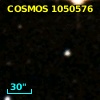 COSMOS J095743.90+015415.0