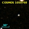 COSMOS J095743.67+015414.1