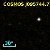 COSMOS J095744.77+015358.2