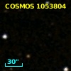 COSMOS J095743.84+015317.9