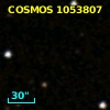 COSMOS J095743.88+015315.4