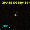 2MASS J09580439+0152162