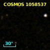 COSMOS J095743.69+015157.6