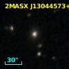 2MASX J13044573+7147568