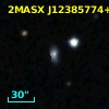 2MASX J12385774+7036045