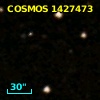 COSMOS J095747.78+015825.0