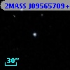 2MASS J09565709+6924532