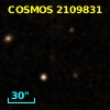 COSMOS J095820.03+022011.5