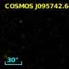 COSMOS J095742.64+022611.5