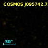 COSMOS J095742.73+022531.4