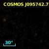 COSMOS J095742.72+022521.8