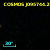 COSMOS J095744.28+024248.6