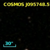 COSMOS J095748.57+023835.5