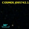 COSMOS J095742.15+025400.8