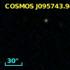 COSMOS J095743.94+025251.3