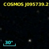 COSMOS J095739.21+025131.6