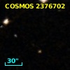 COSMOS J100003.28+023155.8