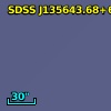 [VV2006c] J135643.7+664128