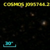 COSMOS J095744.28+023401.3