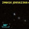 2MASS J09562368+5648062