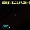 SDSS J112137.36+572117.5