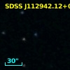 SDSS J112942.12+090231.0