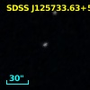 2MASS J12573372+5428505