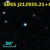 2MASS J21293521+0013321