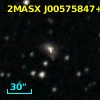 2MASX J00575847+5200047