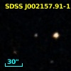 2MASS J00215789-1103318