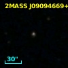 2MASS J09094669+1039439