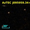 AzTEC J095959.33+023445.8