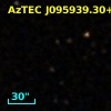 AzTEC J095939.30+023408.0