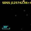 [VV2006c] J125742.5+624221
