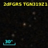 2MASS J12214612+0018355