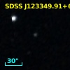 [VV2006c] J123349.9+634956
