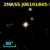 2MASS J06101845-5200234